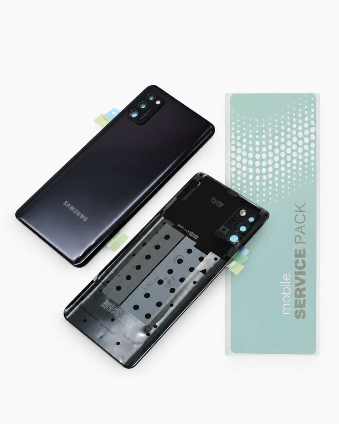 A Samsung smartphone service pack kit on a white background, showing a black Samsung phone back cover, a matching phone back cover without the rear panel, and a mint green 'mobile SERVICE PACK' card.