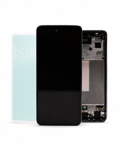 A replacement smartphone front glass display panel with its black screen, shown alongside the inner frame and a light blue protective film on a white background.