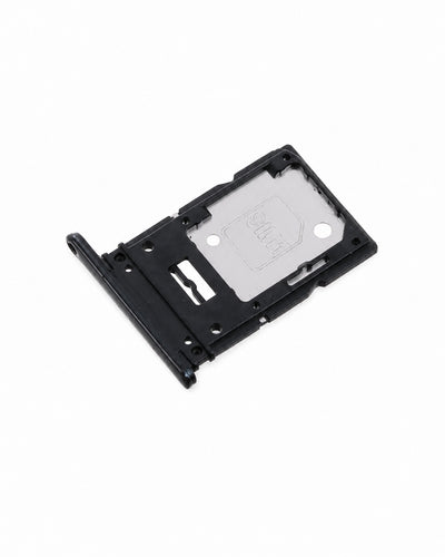 A black plastic SIM card tray insert with a silver metallic contact plate, shown on a plain white background.