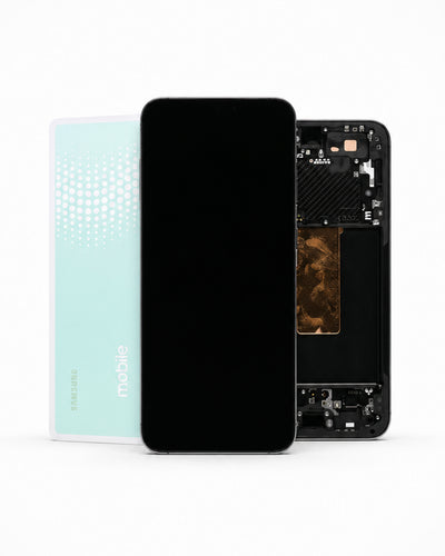 A replacement smartphone screen assembly shown with the front black glass panel in front, alongside the back of a Samsung Galaxy smartphone in mint green and the exposed internal frame of another phone showing the circuit board and RF area.