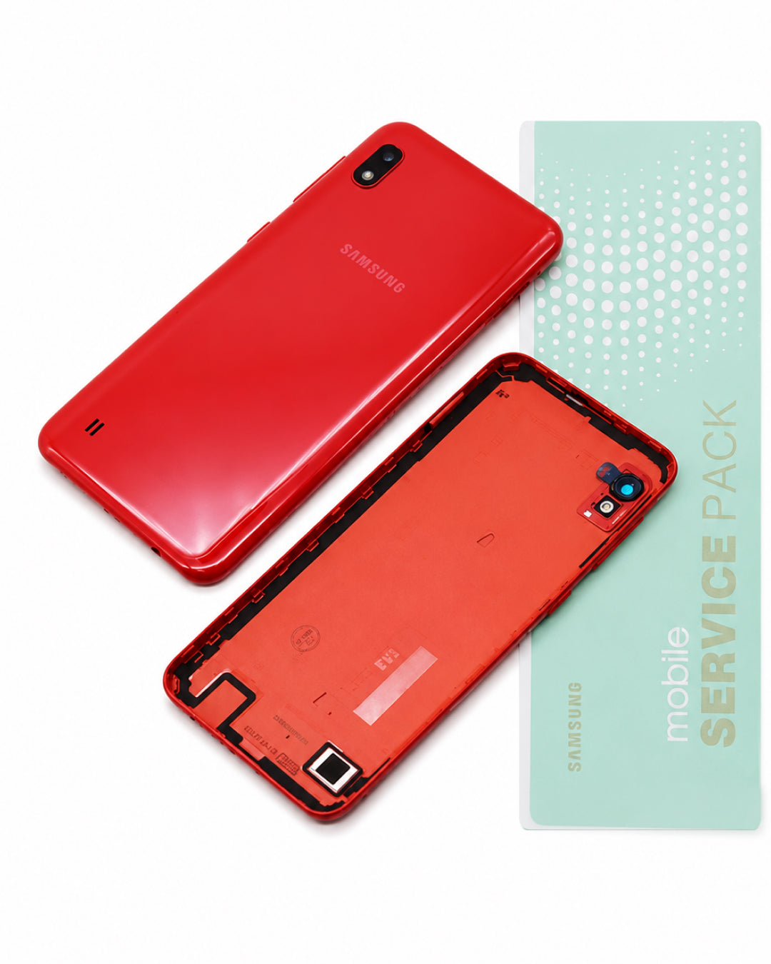 A red Samsung mobile phone back cover shown in two pieces, alongside a mint green 'mobile SERVICE PACK' booklet. The Samsung brand name is visible on the back of the phone cover.