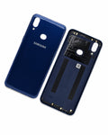 A pair of blue Samsung smartphone back covers, one showing the glossy exterior with the white SAMSUNG logo and the other showing the interior side with adhesive patches and contact points, on a white background.
