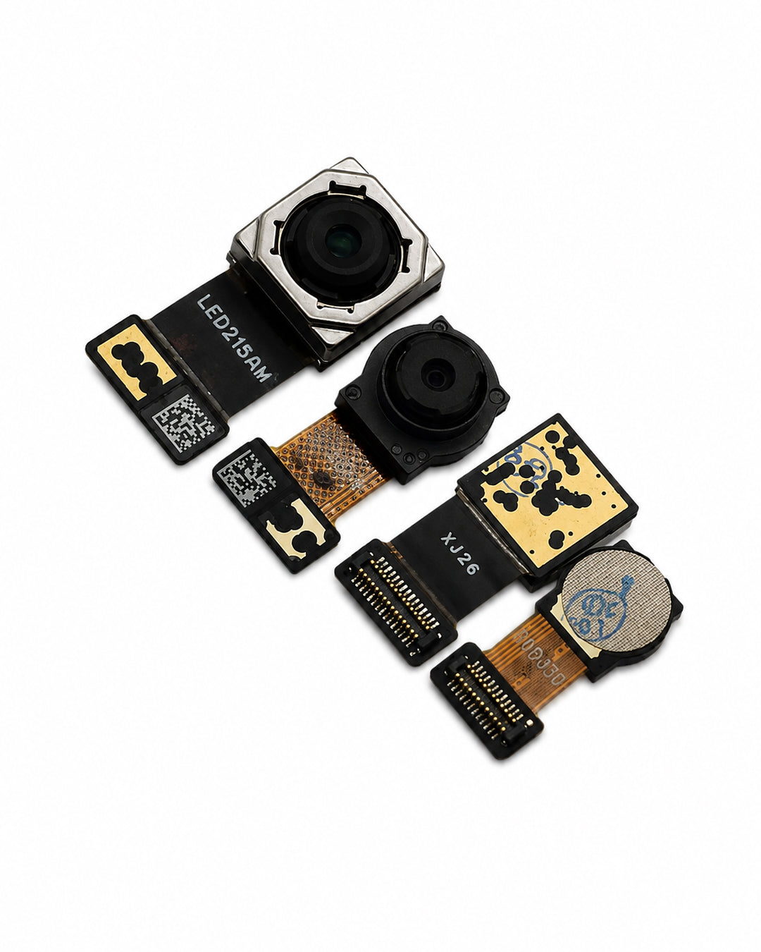 Two small camera module components with attached flex cables and gold-plated contacts, photographed on a clean white background.
