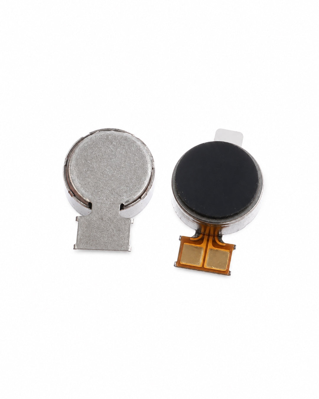 Two small circular electronic components with flat leads, one with a silver top and the other with a black top, shown on a plain white background.