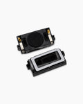 Two small black electronic button module components with gold metal contacts and a silver inner frame, photographed on a clean white background.