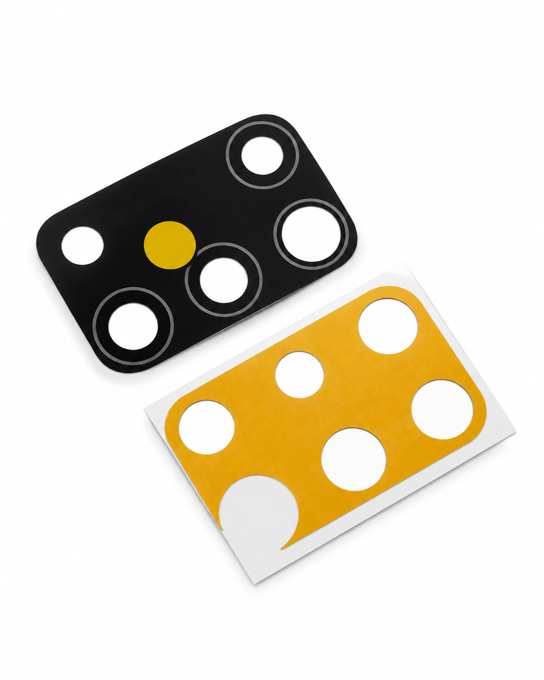 Two rectangular adhesive pads with circular cutouts shown on a white background: one black pad with a yellow center circle and one yellow pad on a white backing sheet.